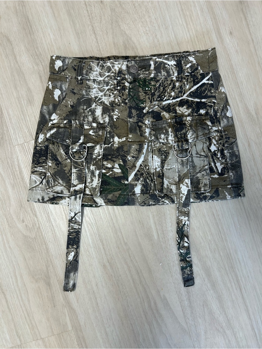 The Rise Supply Co Camouflage Denim Mini Skirt in women's size 1